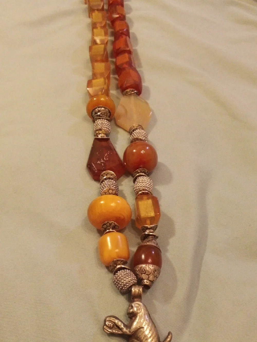 Real Amber-Tone Glass Bead Necklace with Silver Monkey Pendant